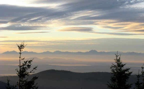 mountain in the distance with a foggy foreground