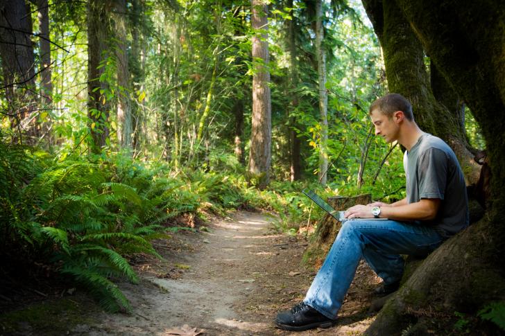student in the woods
