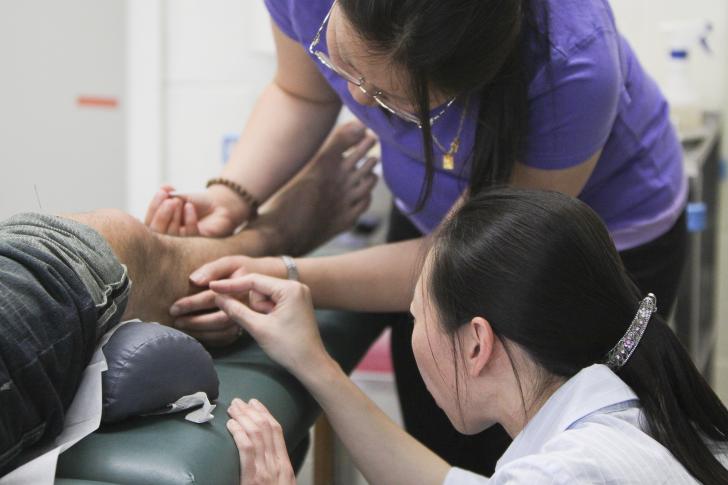 acupuncture student and faculty