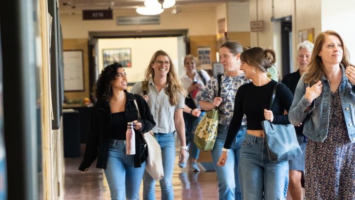 students walking down hallway