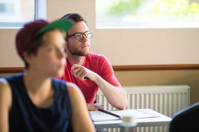 student in class listening