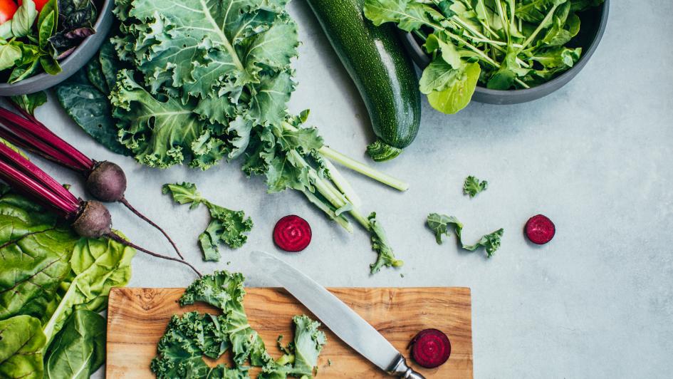beet and kale on cutting board