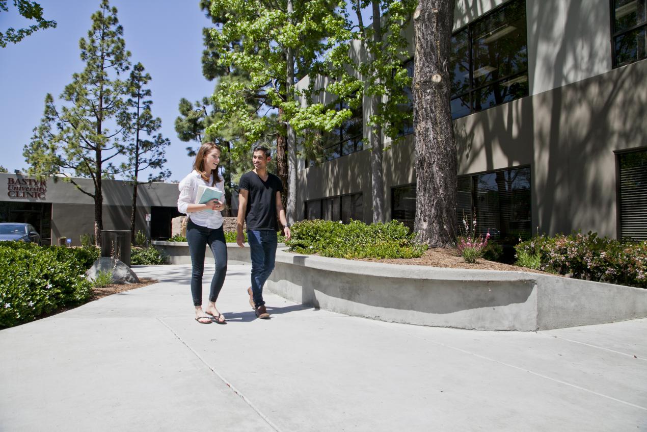two students walking at Bastyr San Diego campus